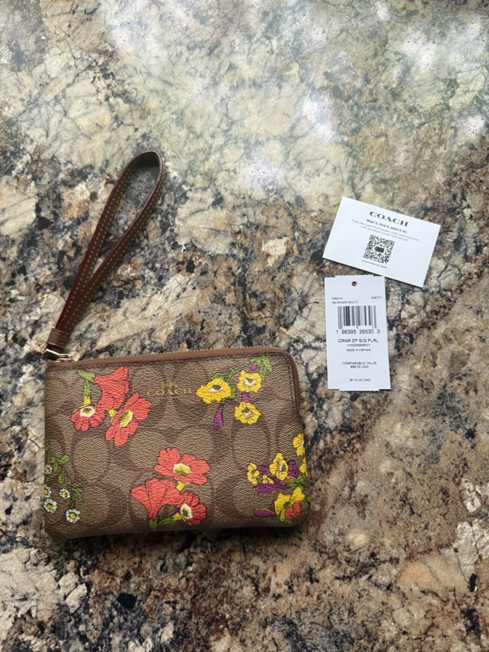 Coach Brown Floral Signature Canvas Wristlet with Red and Yellow Blooms